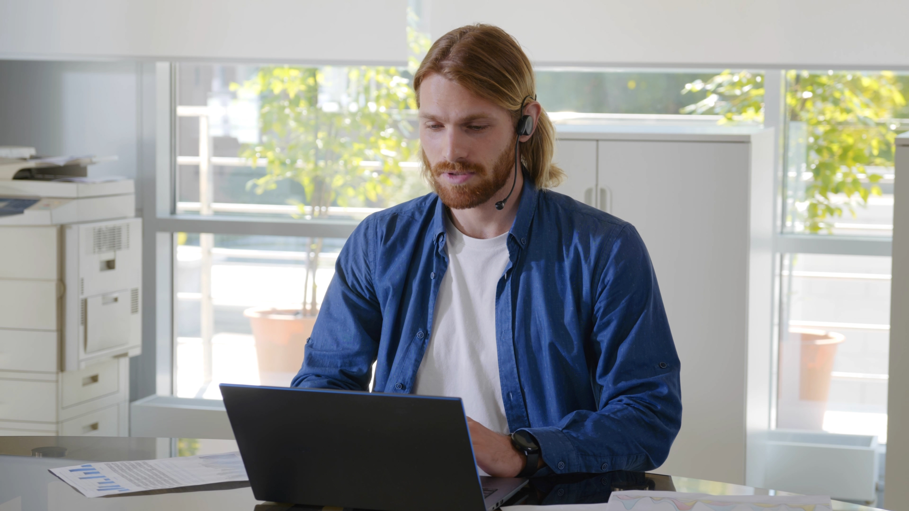 white man at laptop learning